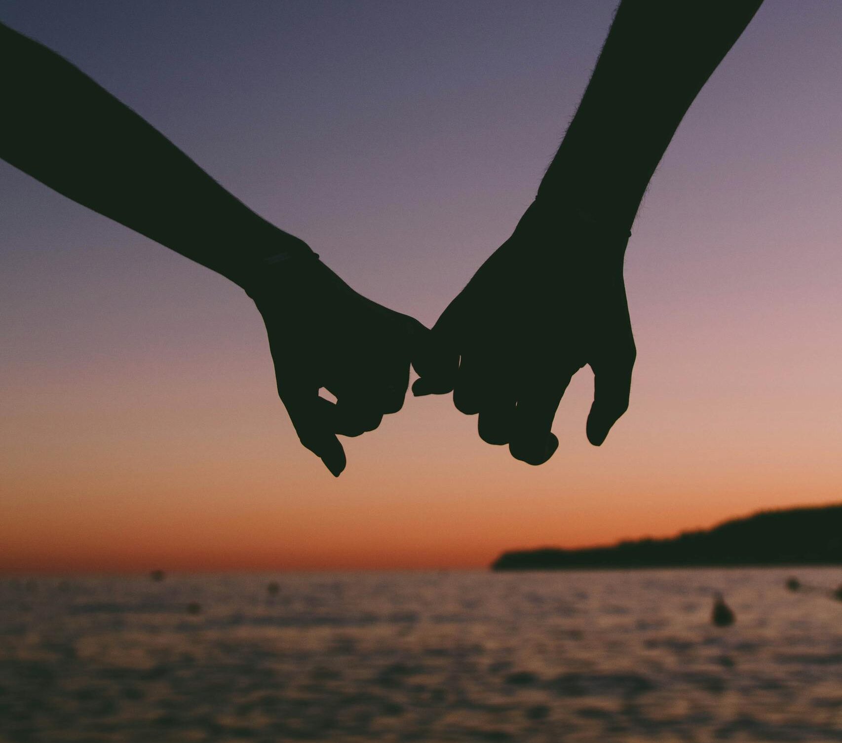Two Person Holding Pinkies